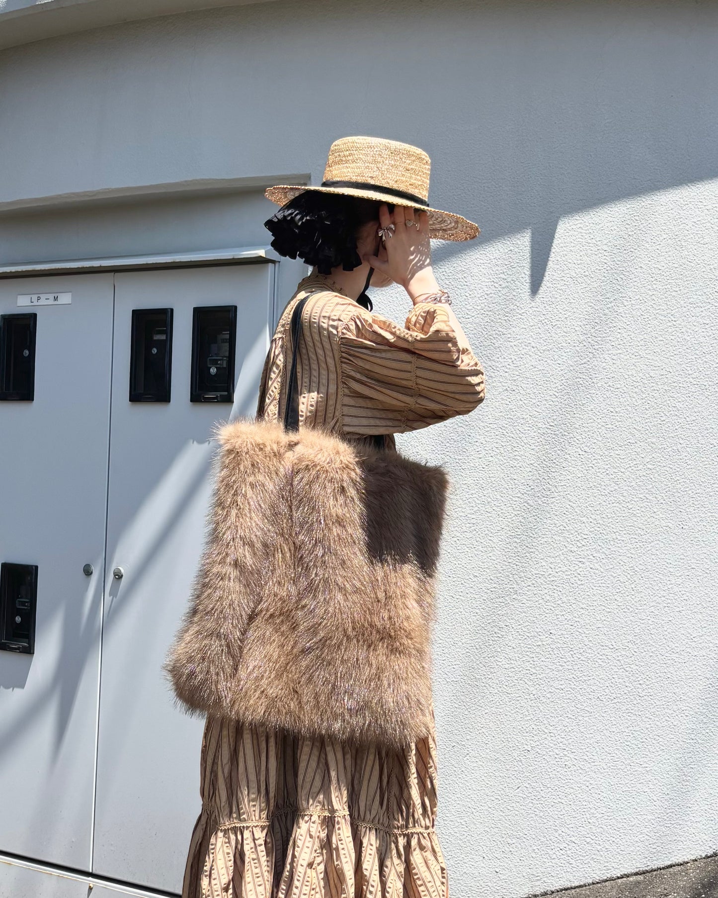 reversible kuma fur bag - brown